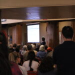 Seattle residents sitting and listening to a presentation on Fort Lawton in 2017.