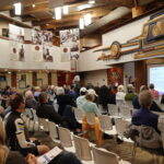 audience listening to a presentation at the Daybreak Star Indian Cultural Center
